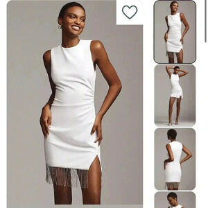 Elegant White Sleeveless Dress with Fringe Detail